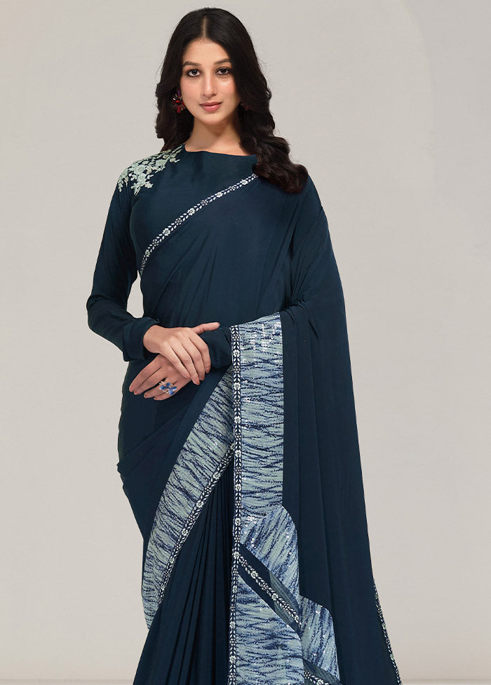 Teal Crepe Silk Saree With Blouse Piece