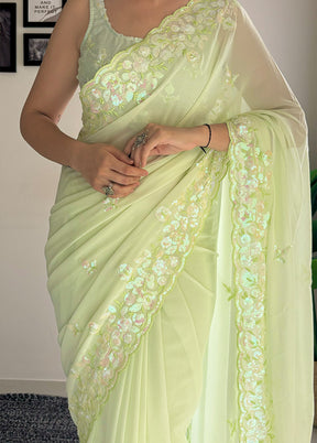 Pista Green Georgette Saree With Blouse Piece