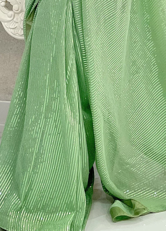 Pista Green Georgette Saree With Blouse Piece