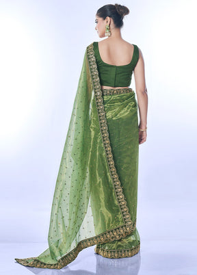 Green Net Net Saree With Blouse Piece