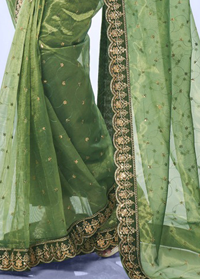 Green Net Net Saree With Blouse Piece