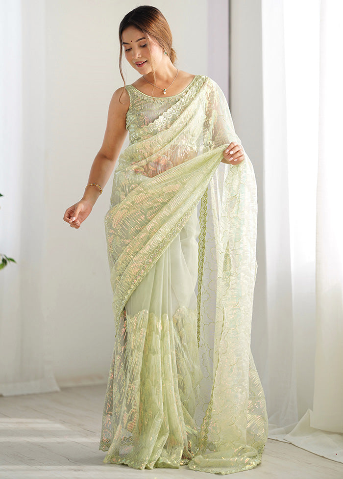 Pista Green Net Net Saree With Blouse Piece