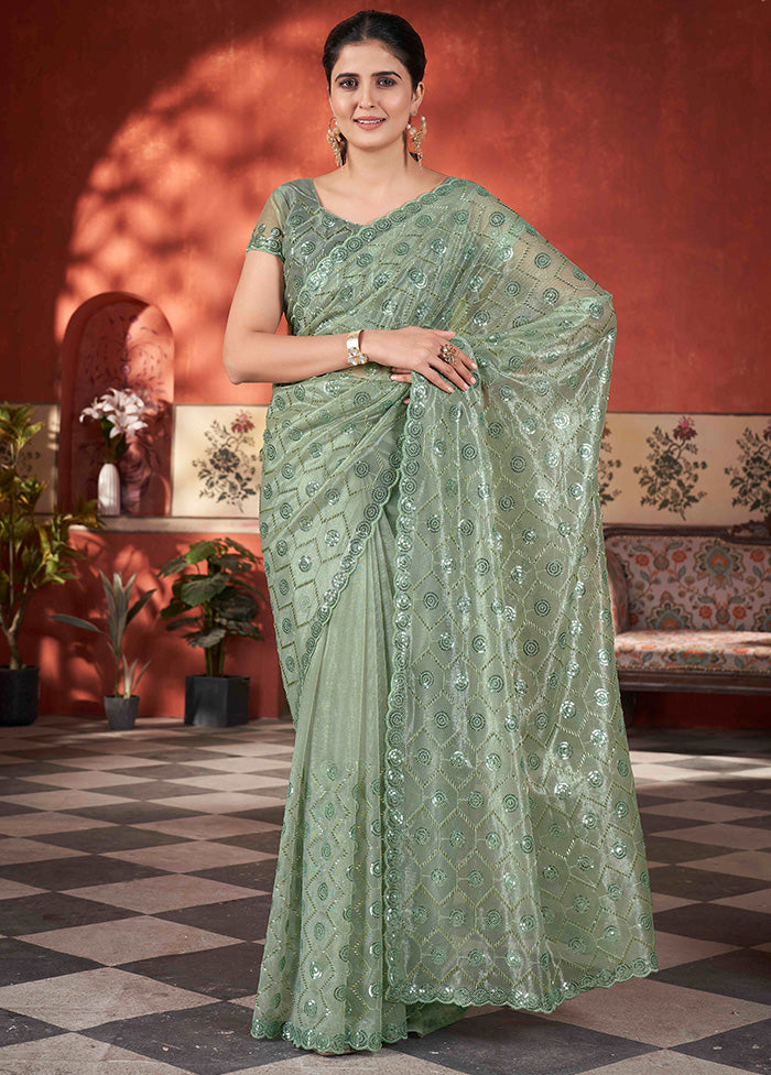 Pista Green Net Net Saree With Blouse Piece