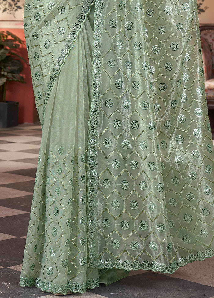 Pista Green Net Net Saree With Blouse Piece