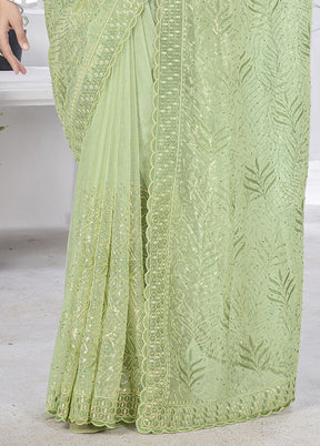 Green Net Net Saree With Blouse Piece