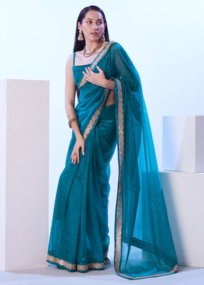 Firoza Net Net Saree With Blouse Piece