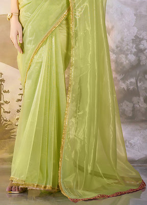 Pista Green Net Saree With Blouse Piece