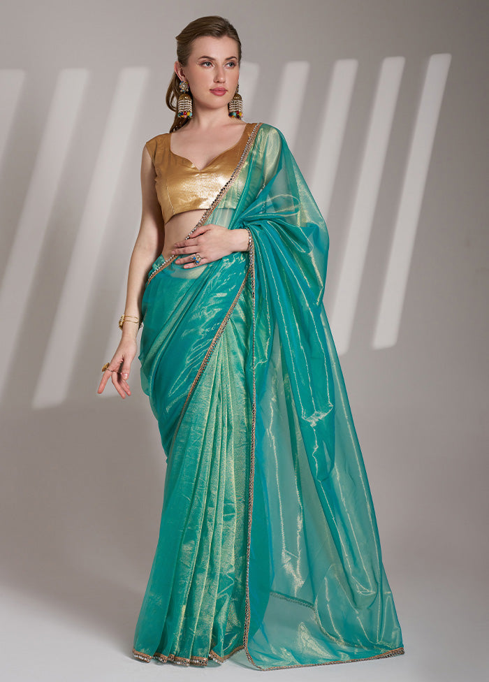 Rama Net Saree With Blouse Piece