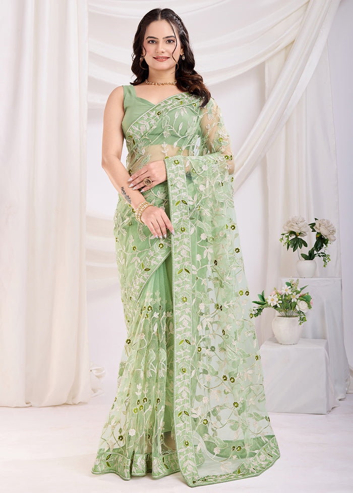 Pista Green Net Saree With Blouse Piece