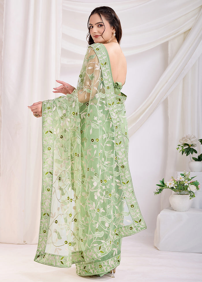 Pista Green Net Saree With Blouse Piece