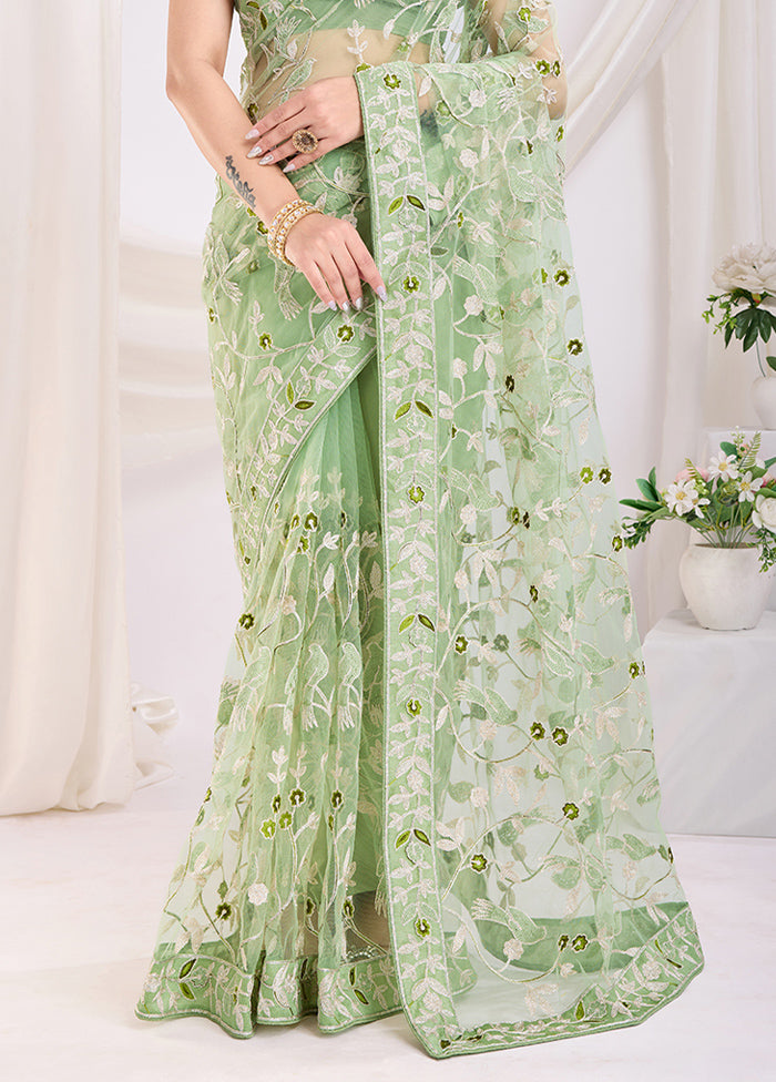 Pista Green Net Saree With Blouse Piece