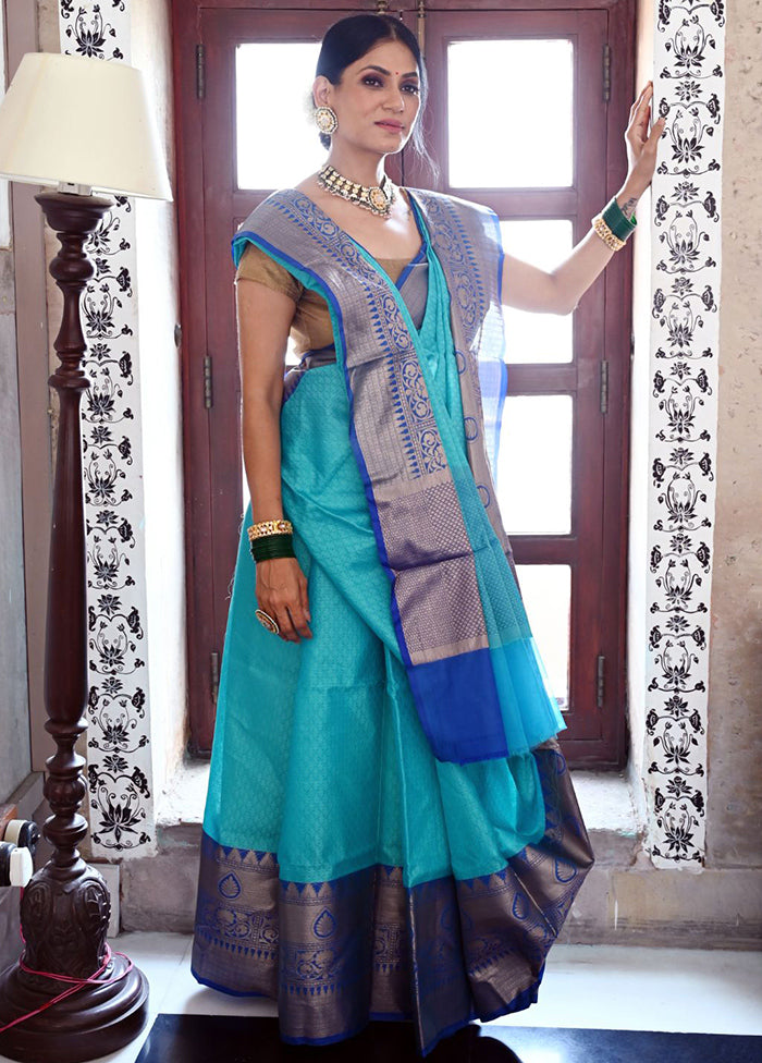 Turquoise Blue Silk Saree With Blouse Piece