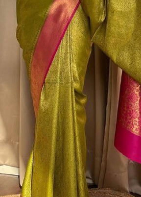 Green Banarasi Silk Saree With Blouse Piece