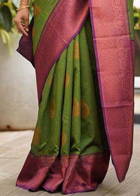 Green Banarasi Silk Saree With Blouse Piece