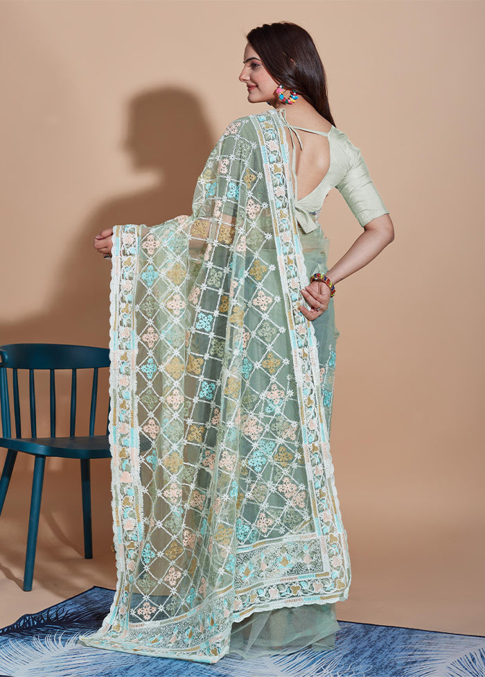 Pista Green Net Net Saree With Blouse Piece