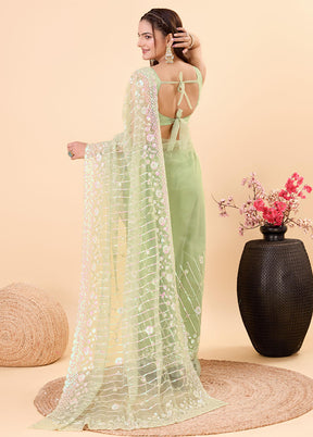 Pista Green Net Net Saree With Blouse Piece