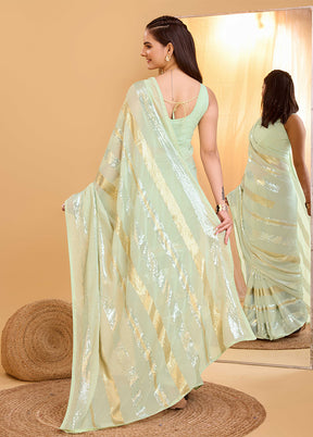 Pista Green Georgette Saree With Blouse Piece