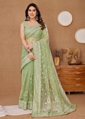 Pista Green Net Net Saree With Blouse Piece