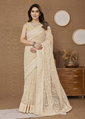 Cream Net Saree With Blouse Piece