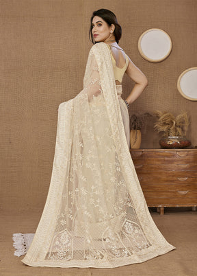 Cream Net Saree With Blouse Piece