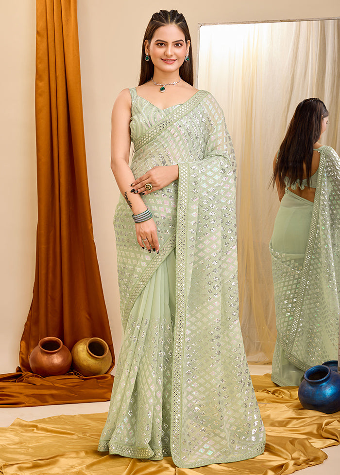 Pista Green Georgette Saree With Blouse Piece