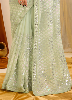 Pista Green Georgette Saree With Blouse Piece