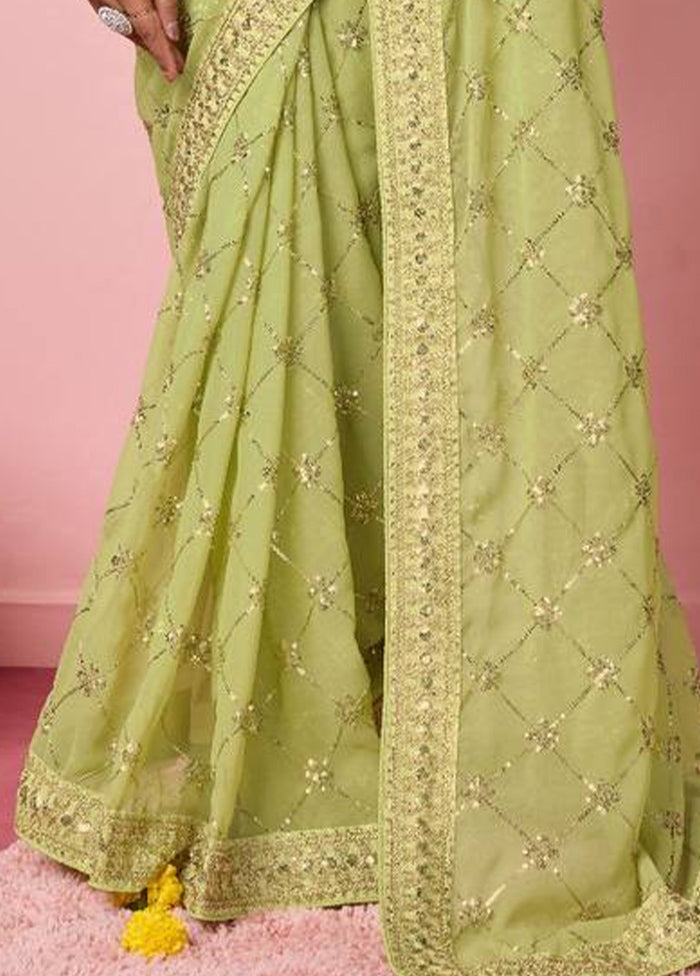 Pista Green Georgette Saree With Blouse Piece