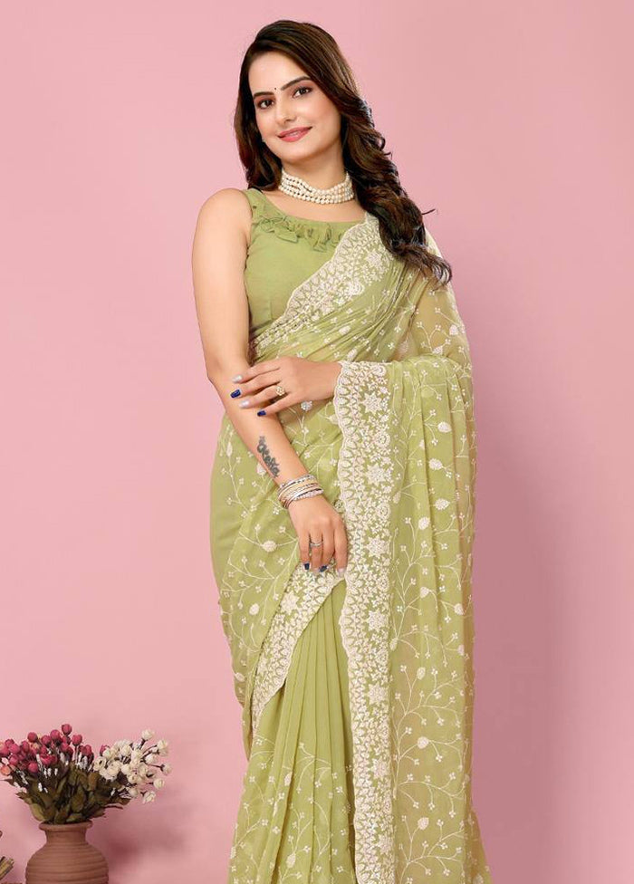 Pista Green Georgette Saree With Blouse Piece