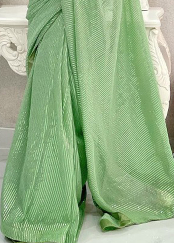 Pista Green Georgette Saree With Blouse Piece