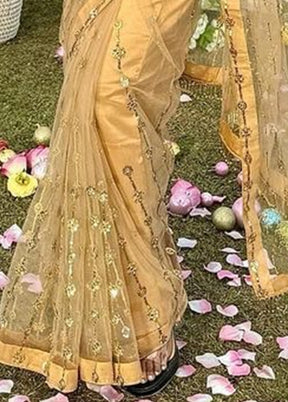 Gold Net Net Saree With Blouse Piece