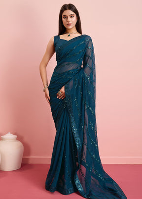 Teal Georgette Saree With Blouse Piece