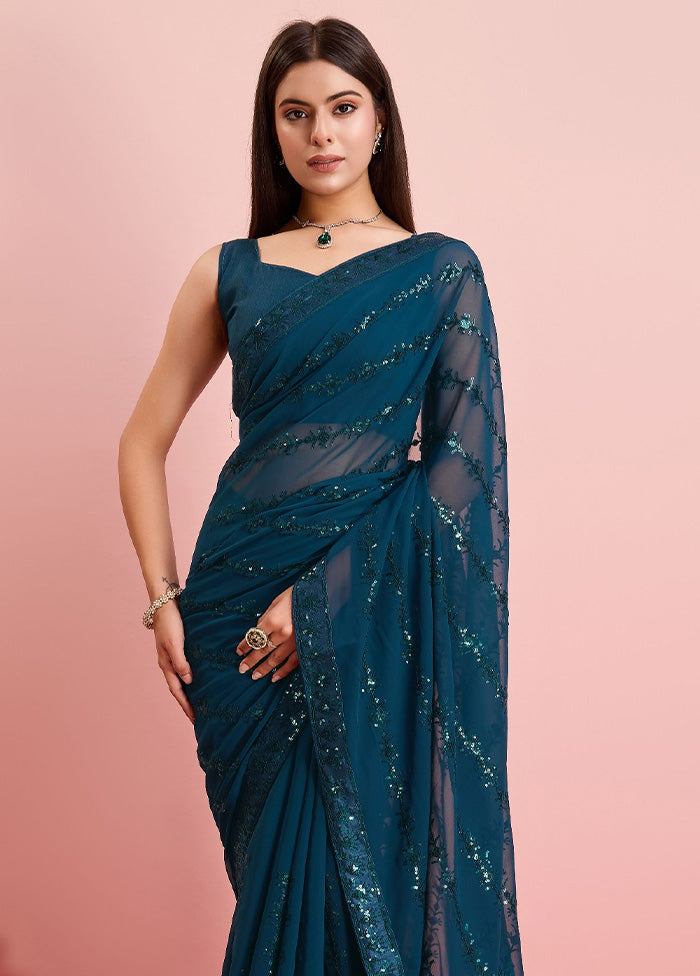 Teal Georgette Saree With Blouse Piece