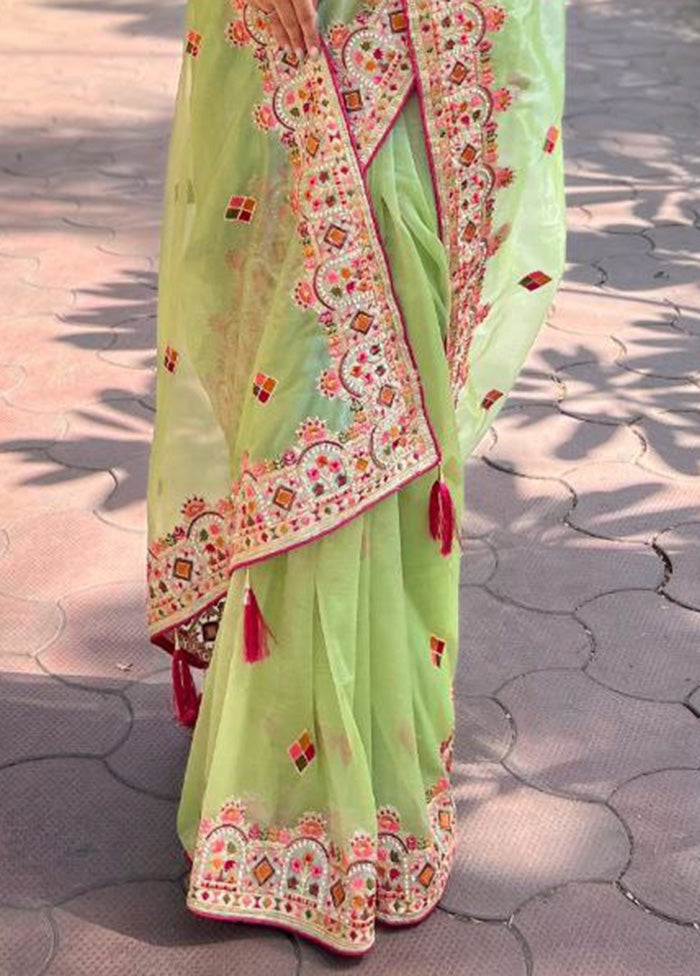 Pista Green Net Saree With Blouse Piece