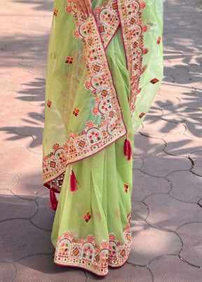 Pista Green Net Saree With Blouse Piece