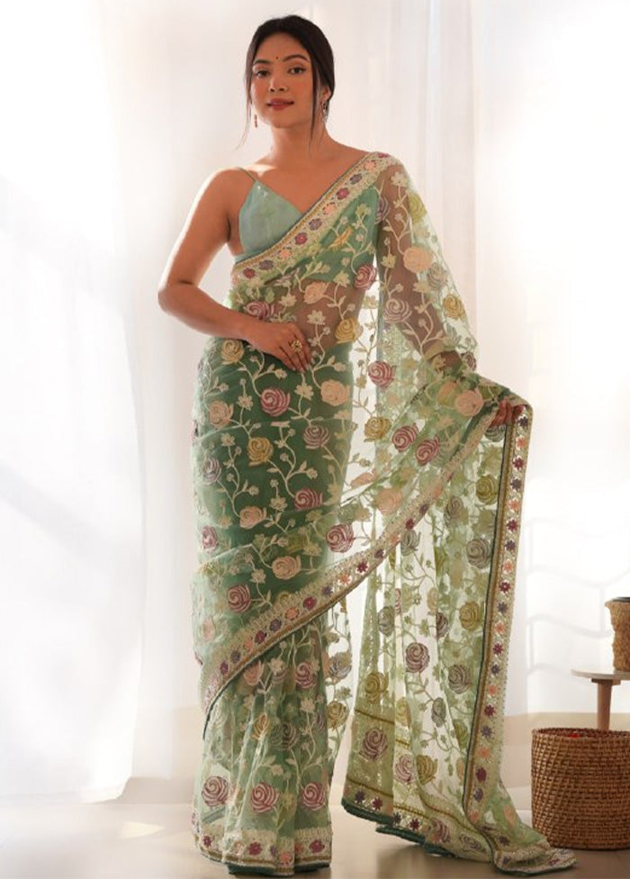 Pista Green Net Saree With Blouse Piece