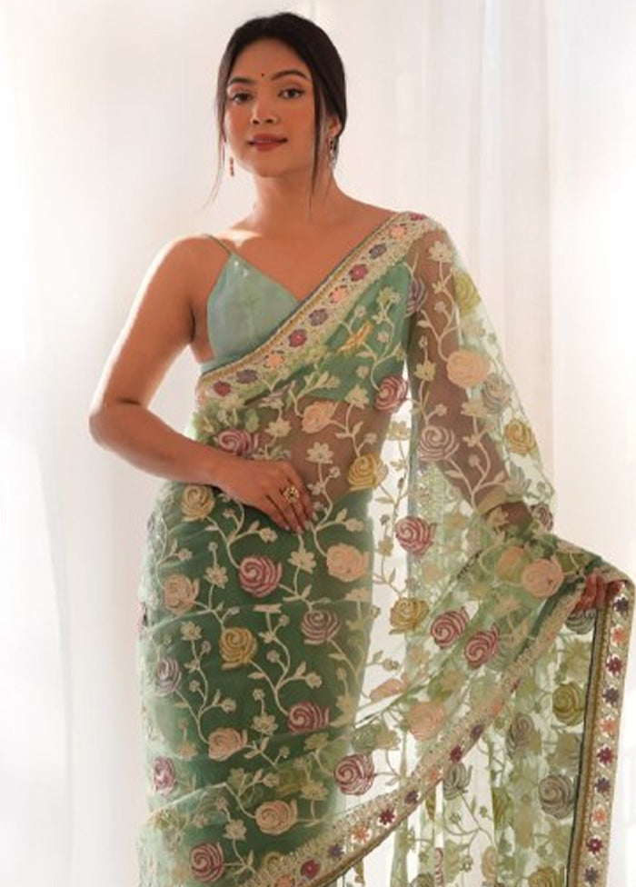 Pista Green Net Saree With Blouse Piece