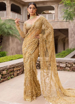 Golden Net Saree With Blouse Piece