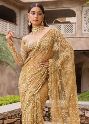 Golden Net Saree With Blouse Piece