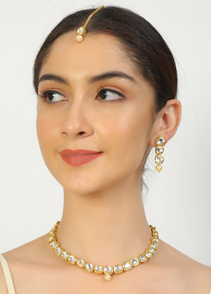 Golden Kundan Work Copper And Alloy Necklace With Earrings And Mangtika