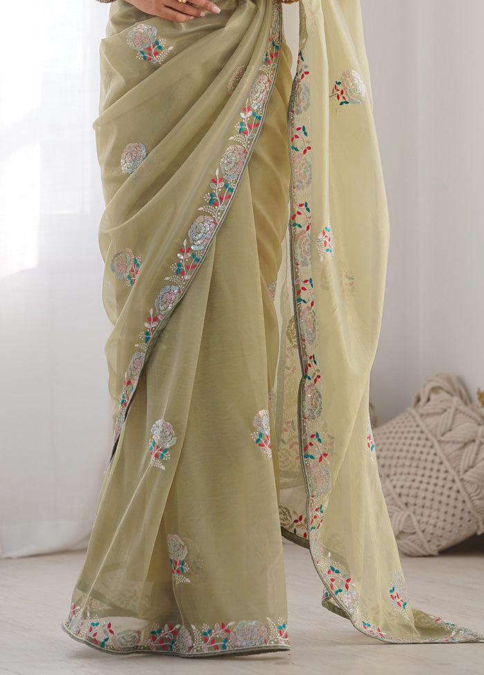 Pista Green Net Net Saree With Blouse Piece