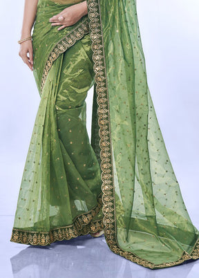 Green Net Net Saree With Blouse Piece