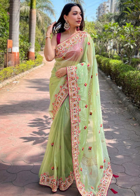 Green Net Net Saree With Blouse Piece