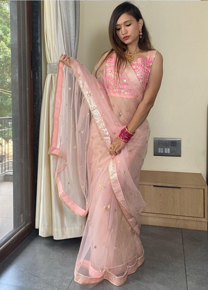 Pink Net Net Saree With Blouse Piece