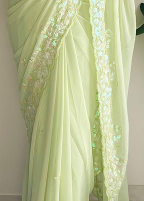 Pista Green Georgette Saree With Blouse Piece