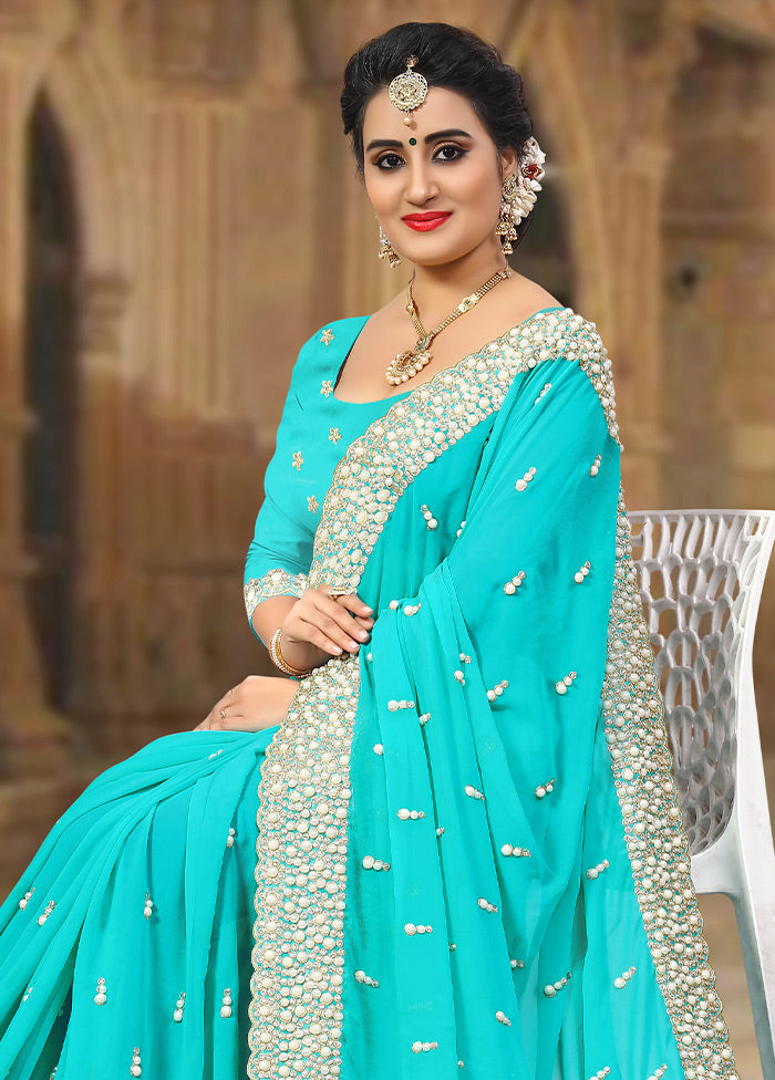 Turquoise Blue Georgette Saree With Blouse Piece - Indian Silk House Agencies